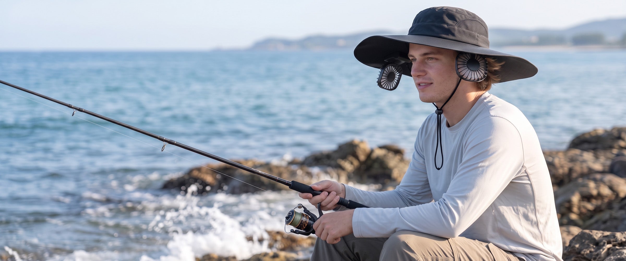 LINKSOLAR F2 Solar Fan Hat in an outdoor coastal setting