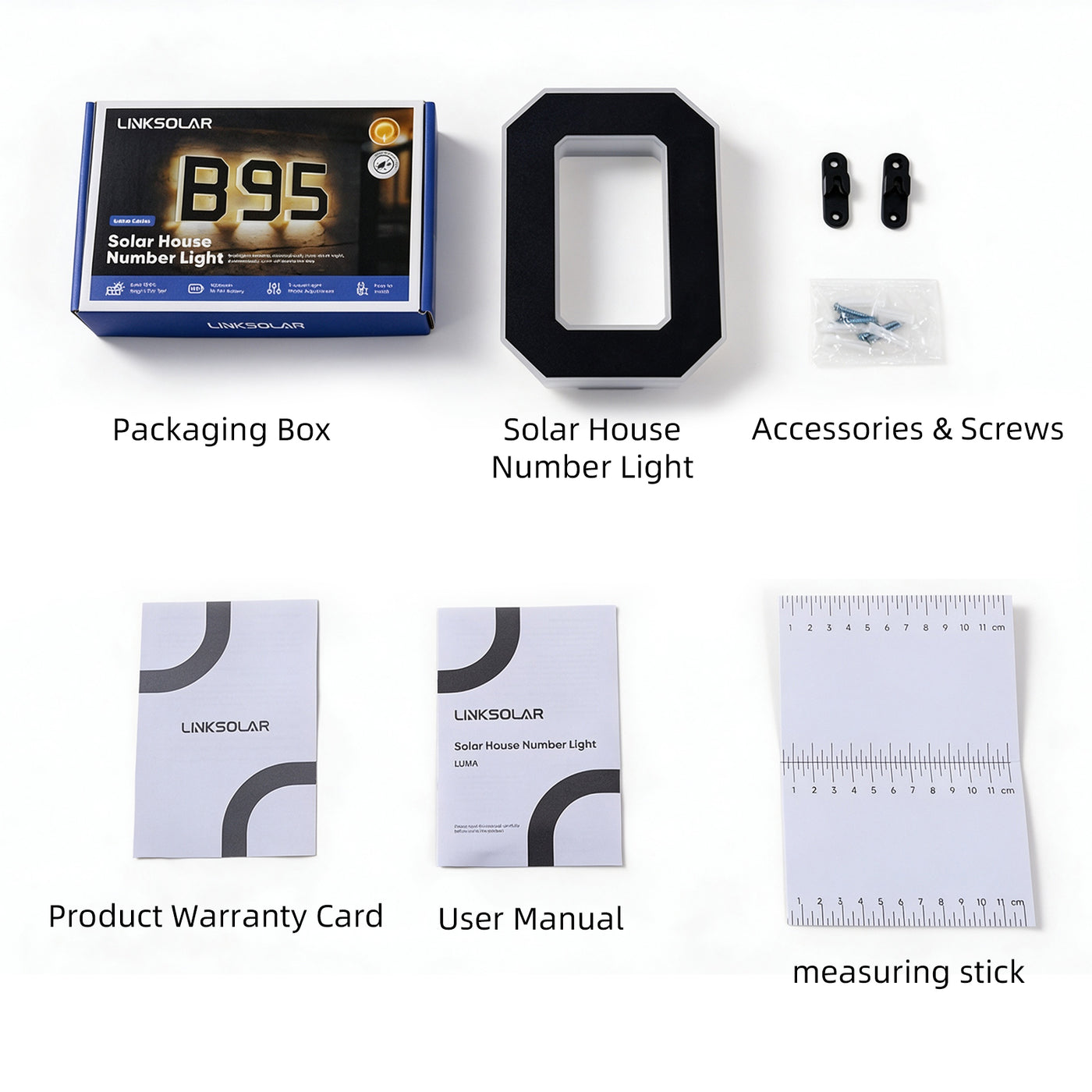 Luma package contents including one character light, mounting hardware, instructions, warranty card and measuring guide