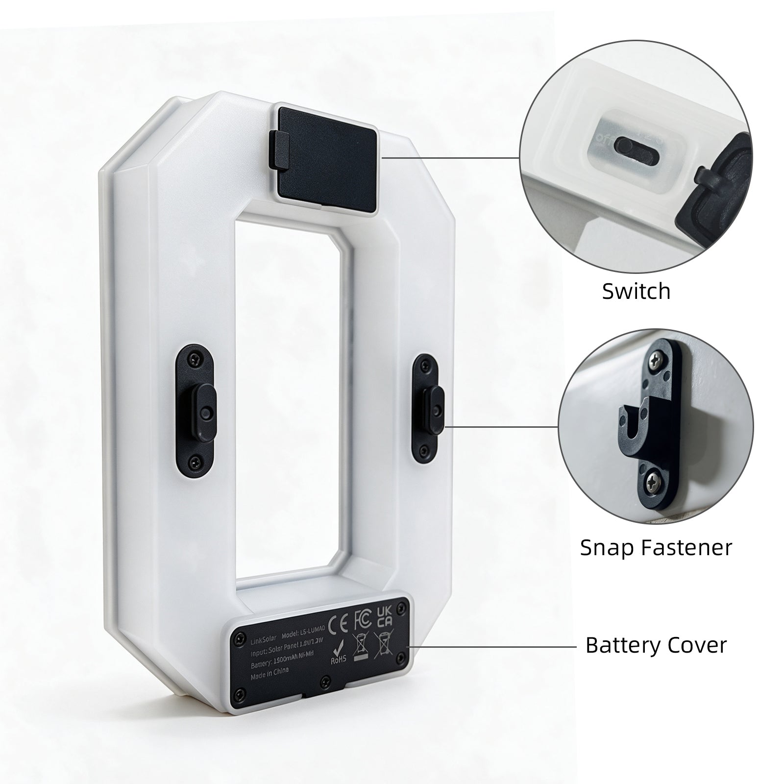 Rear controls, mounting clips and battery cover on a Luma solar house number